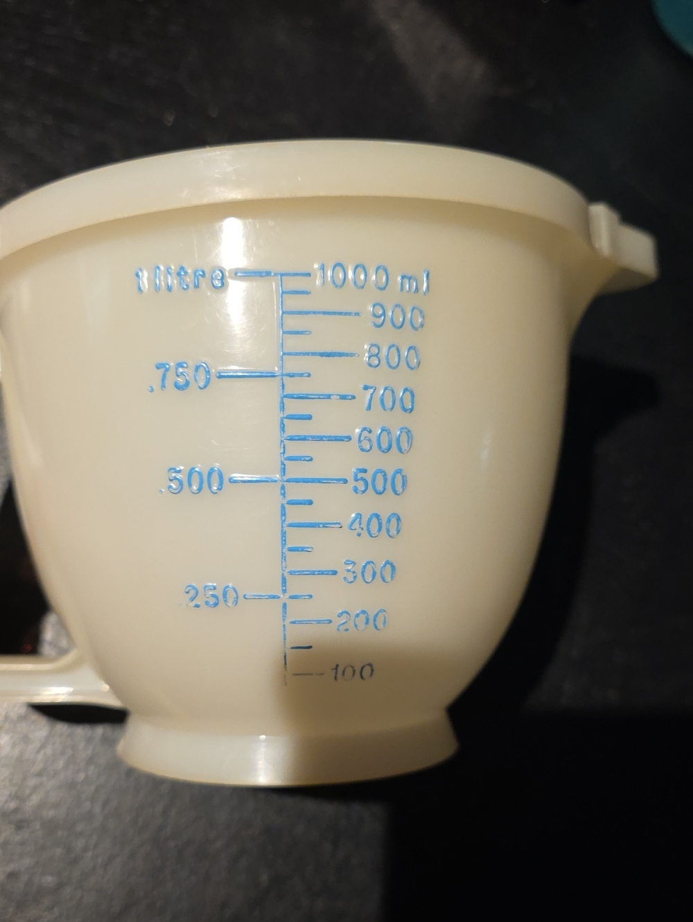 Plastic Measuring Cup with Blue Markings